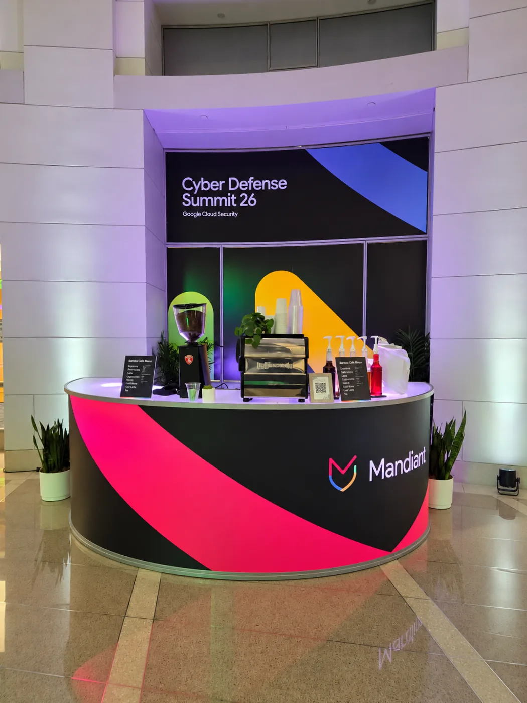 New Life Coffee Company espresso bar wrapped in Mandiant branding at Google Cloud Security's Cyber Defense Summit