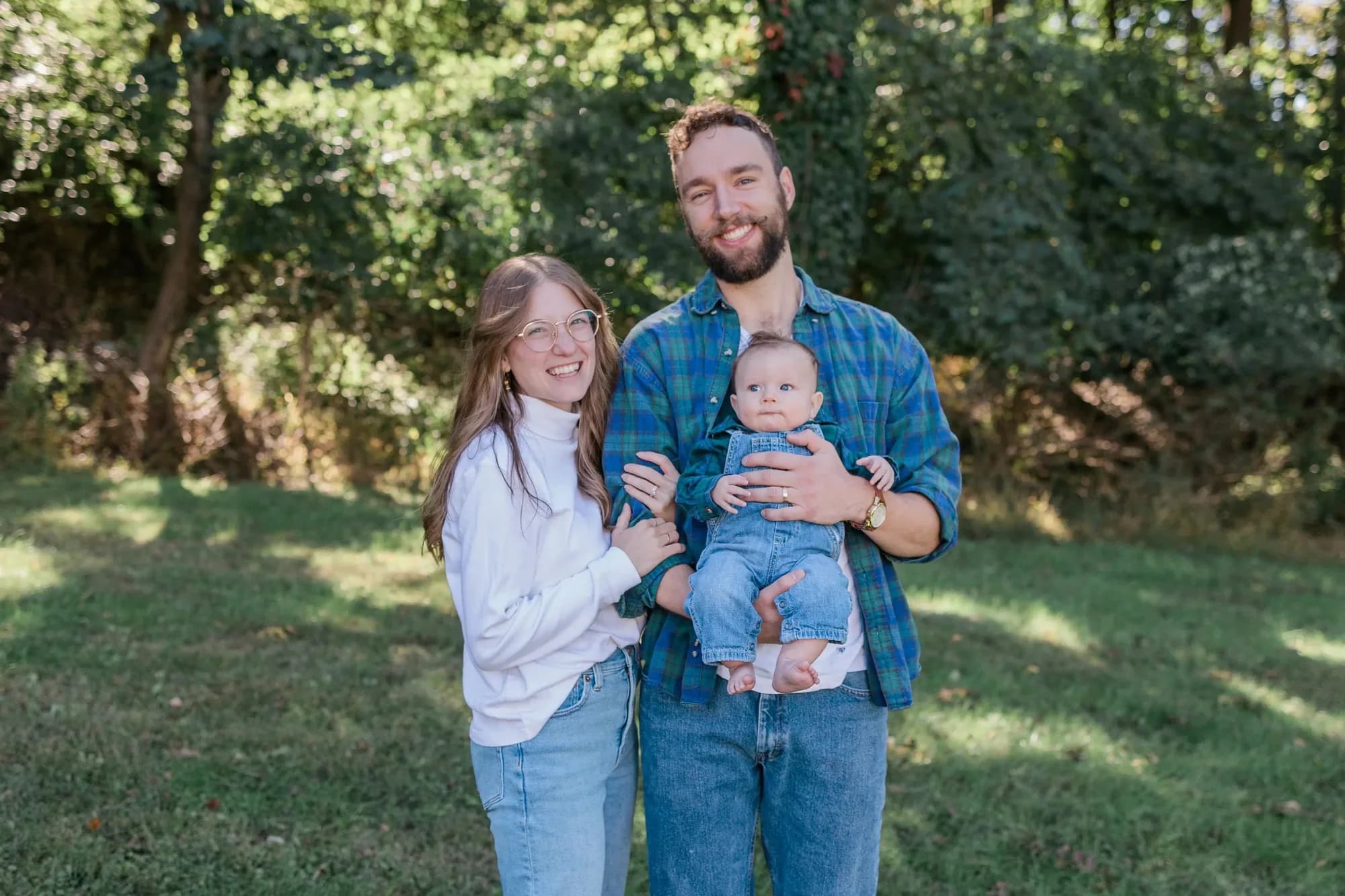 Jesse and Hannah Hoffman, the family owners of New Life Coffee Company, with their child