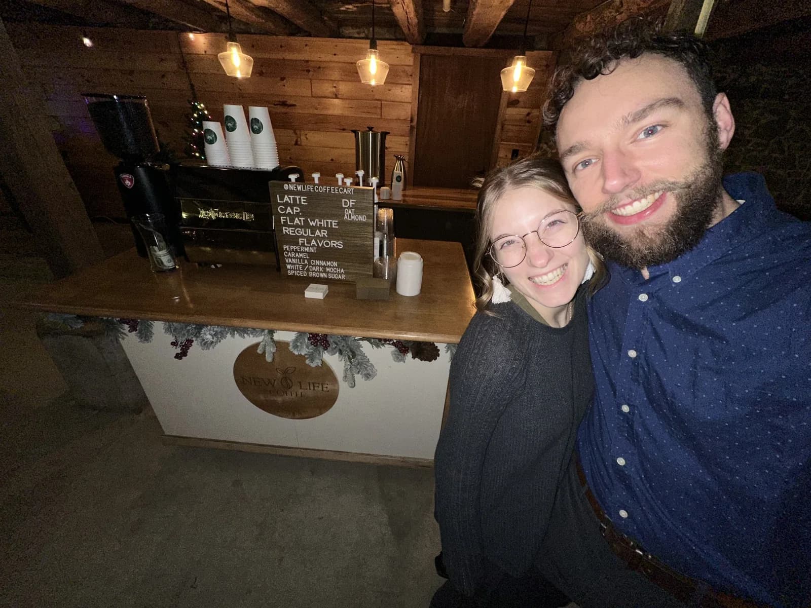 Jesse and Hannah Hoffman behind the New Life Coffee Company cart at an event