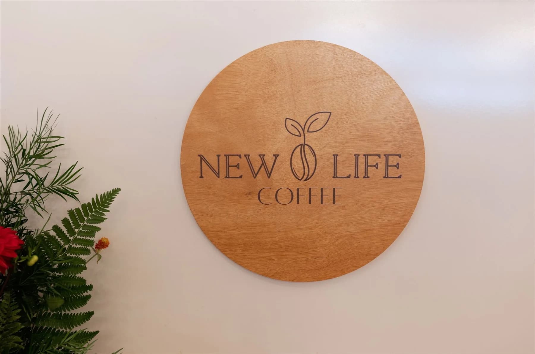 New Life Coffee Company branded cart signage and menu board at an event